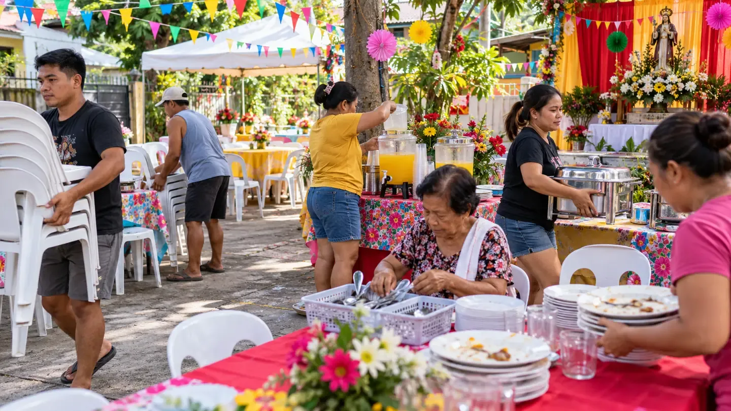 Relatives and neighbours sharing Fiesta preparation work in a community space