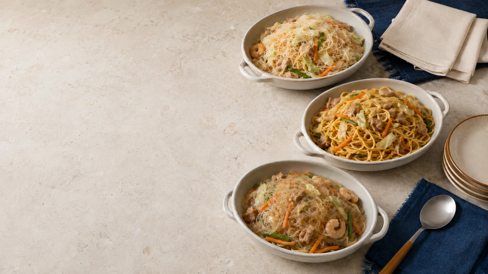 Three different pancit noodle styles arranged for comparison